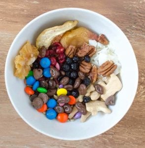 top view of ingredients for trail mix in a bowl