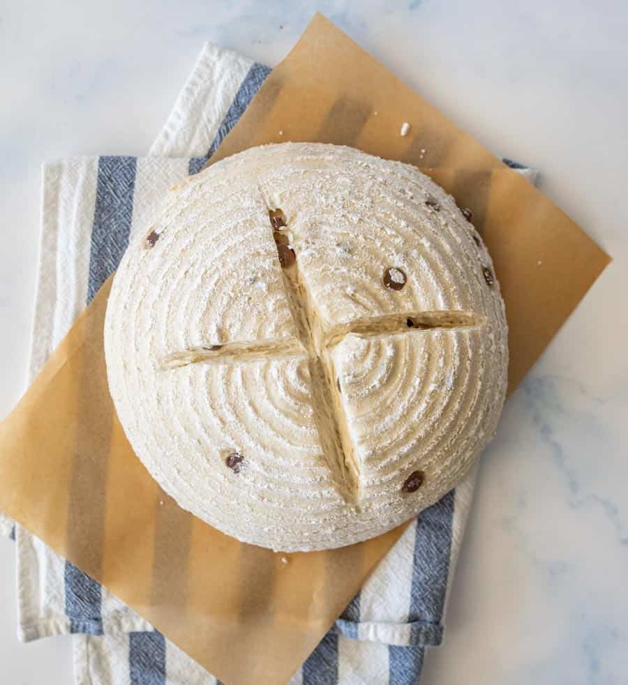 top view of chocolate chip sourdough bread dough on parchment paper