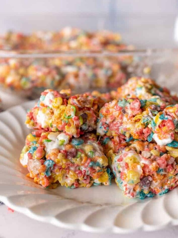 close up picture of fruity pebble treats on a plate