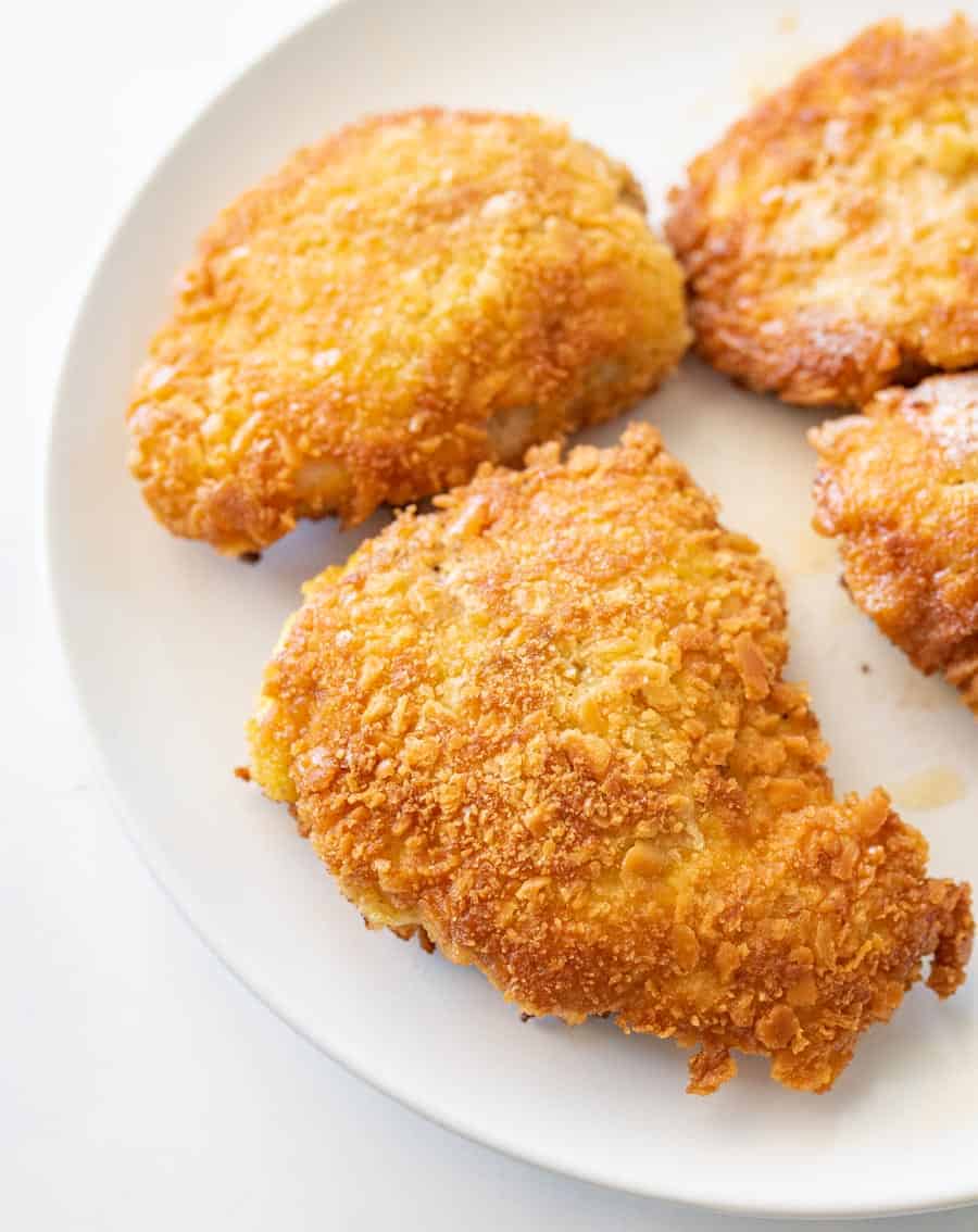 close up parmesan crusted chicken on a plate