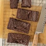 top view of brownies cut into bars on a cooling rack