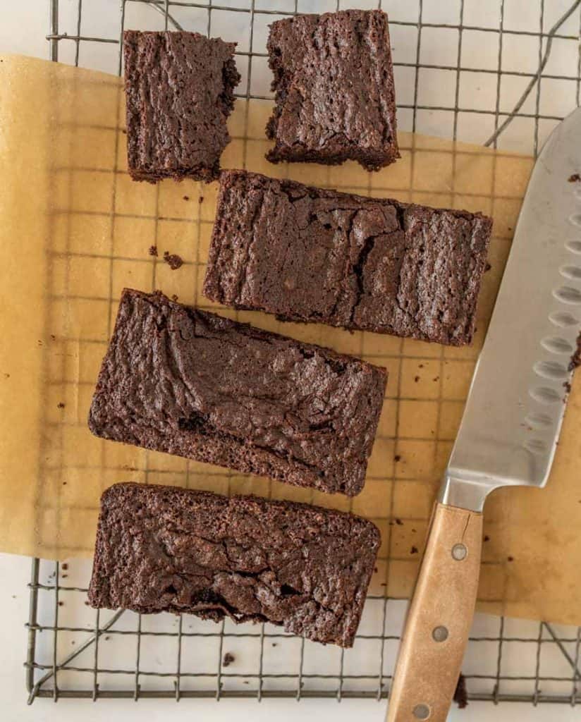 top view of brownies cut into bars on a cooling rack