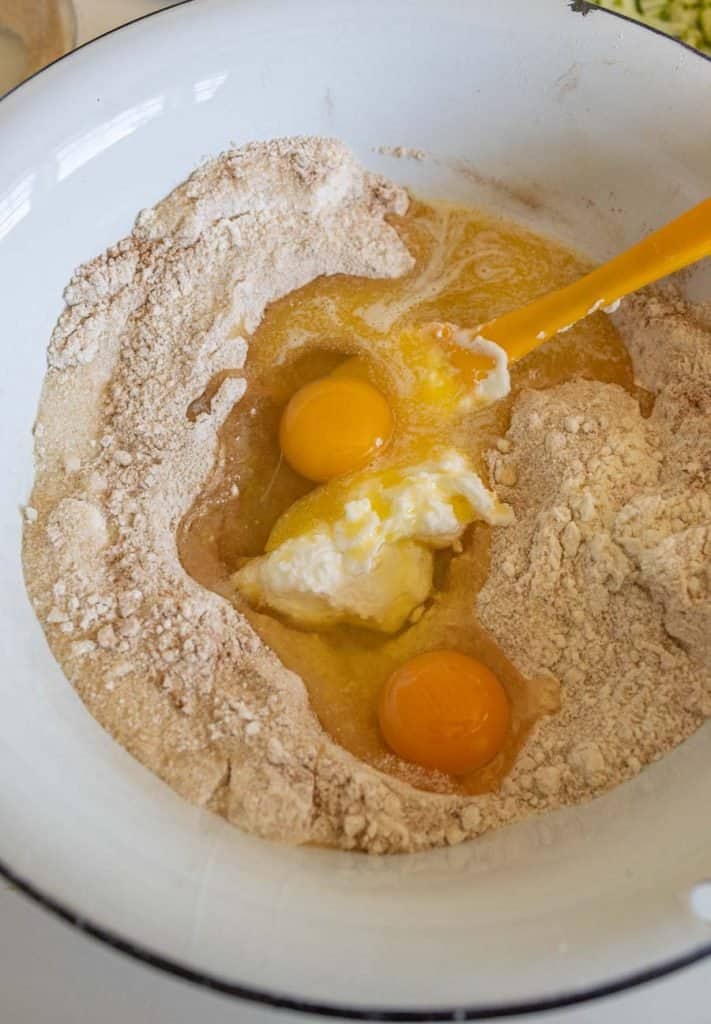 bowl of eggs in flour