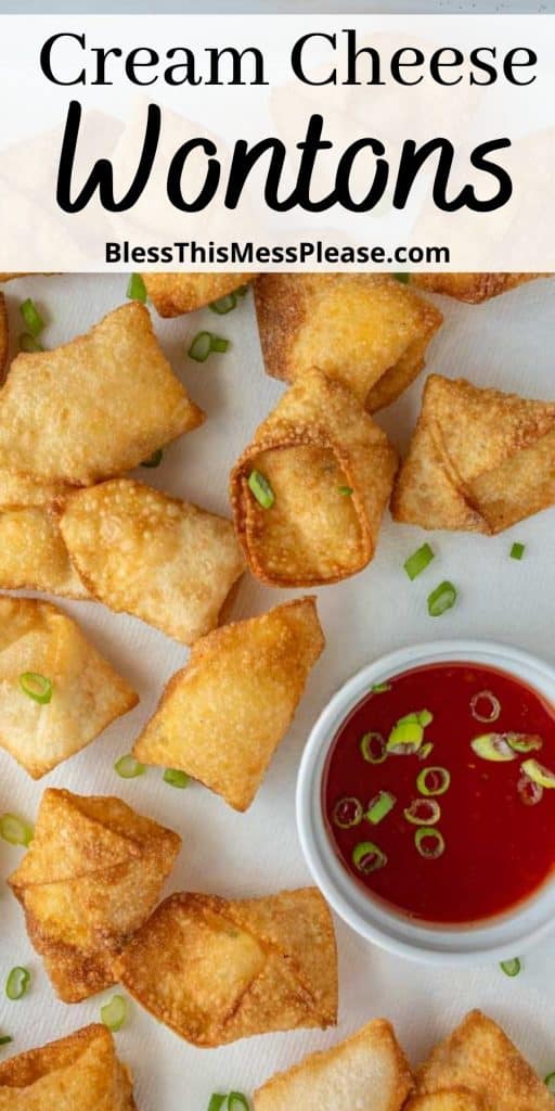 top view of wontons and dipping sauce with the words "cream cheese wontons" written at the top