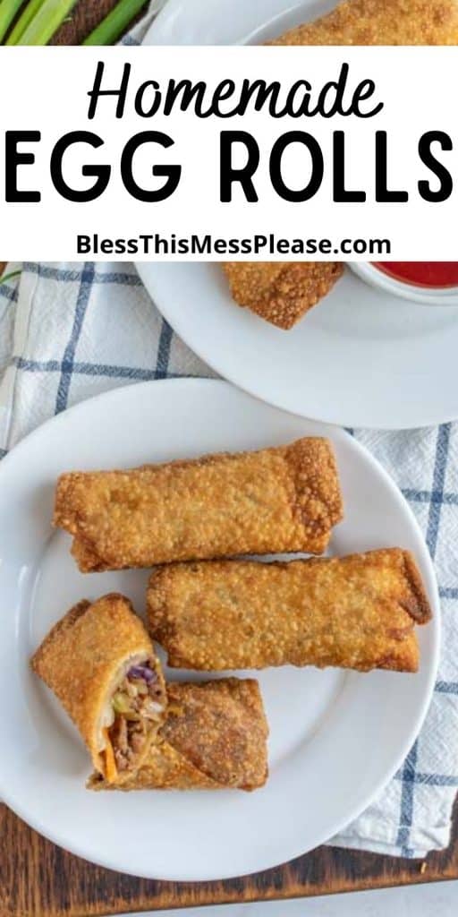 top view of an egg roll cut in half of a plate next to other egg rolls with the words "homemade egg rolls" written at the top
