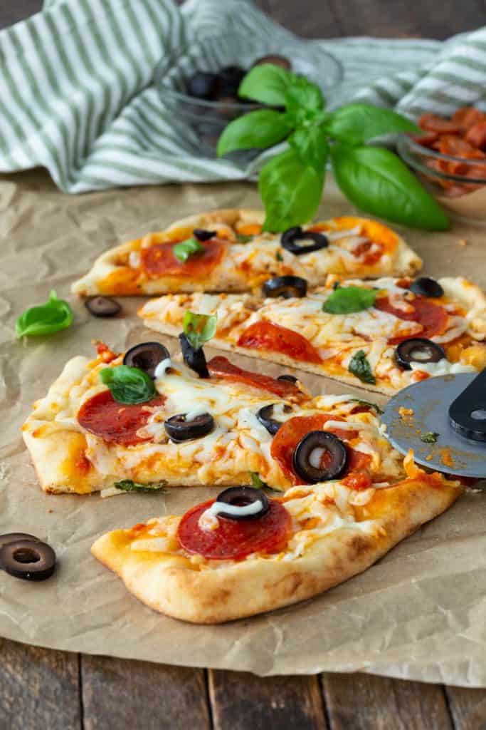 Sliced Flatbread Pizza with toppings and cheese