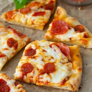 picture of pepperoni flatbread pizza cut into slices.