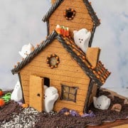picture of a haunted gingerbread house with marshmallow ghosts