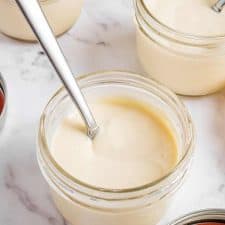 jars of homemade vanilla pudding