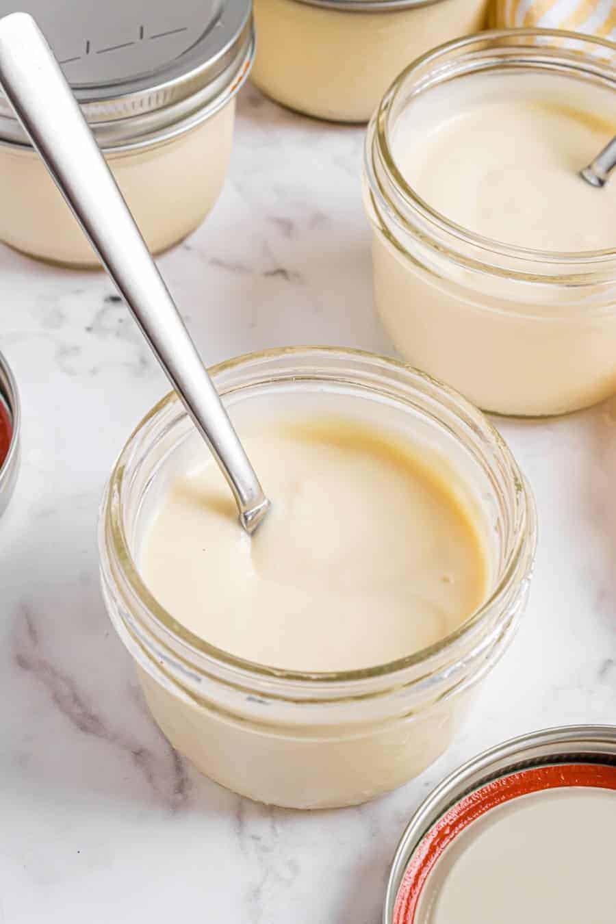 jars of homemade vanilla pudding