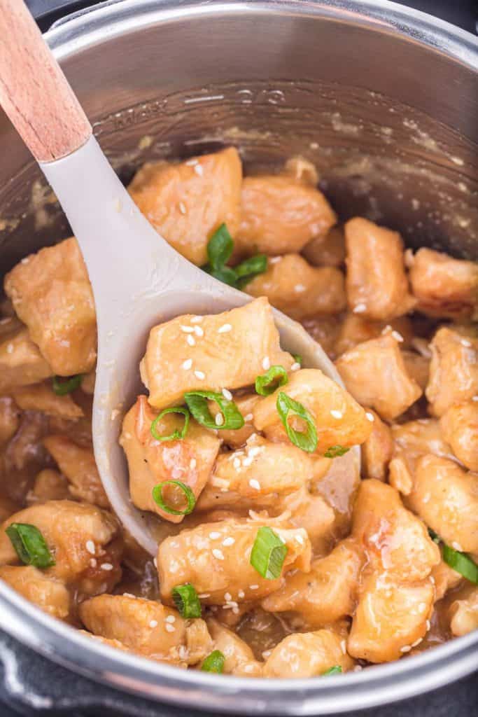 spoonful of honey sesame chicken in an instant pot