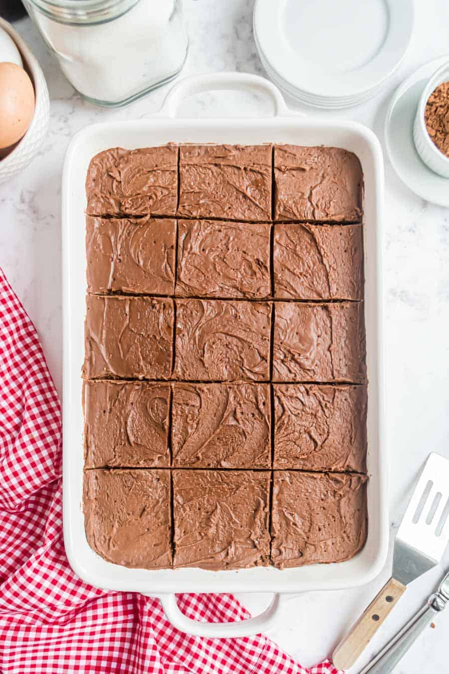 top view of brownies in the baking dish, cut into squares