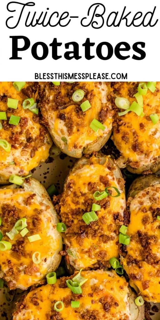 pinterest pin with text that reads "twice-baked potatoes" - a close up top view of several baked potatoes with shredded cheese and bacon bits and chives