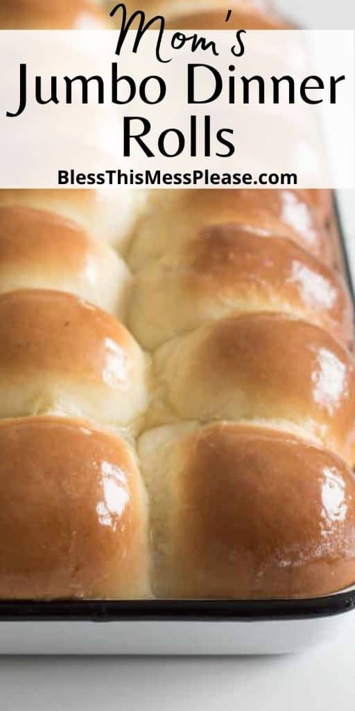 pinterest pin with text that reads "moms jumbo dinner rolls" - image of buttery topped baked rolls still in the sheet pan