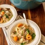 white plate with chicken tortellini soup