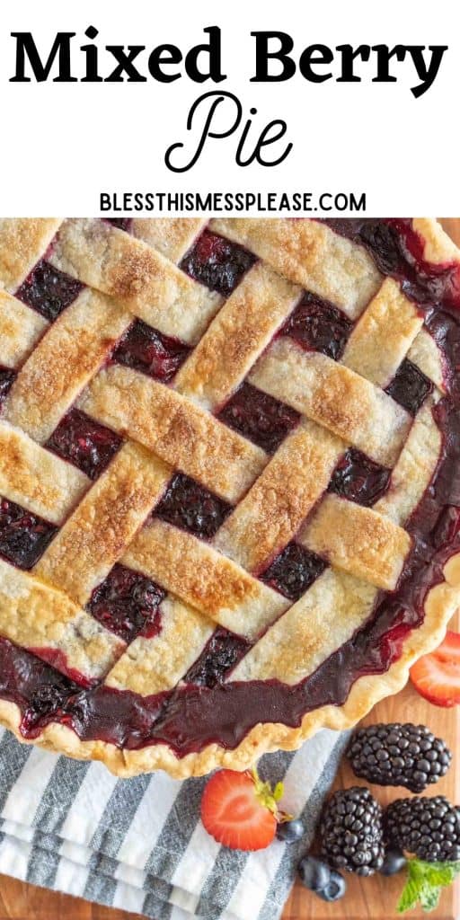 pinterest pin with text that reads "mixed berry pie" - a whole berry pie that has a baked golden lettuce top and deep purple and red showing through