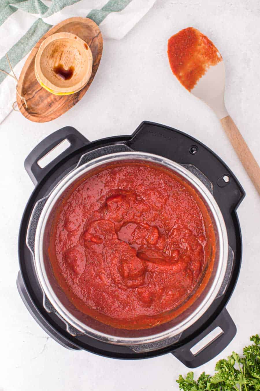 Top view of an Instant Pot filled with spaghetti sauce.