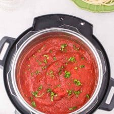 top view of instant pot with red spaghetti sauce