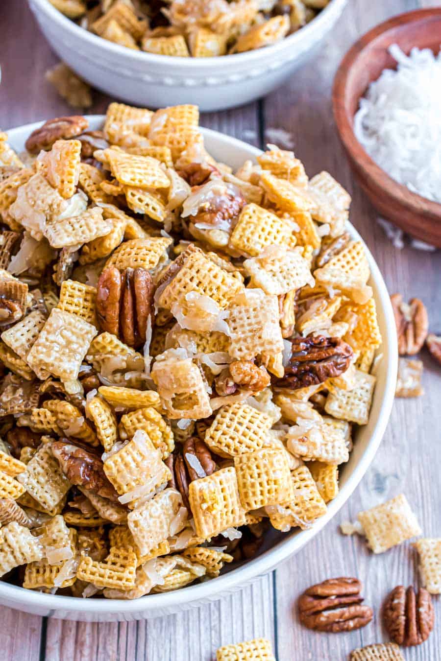 top view white bowl of festiverecipe for sweet chex mix.