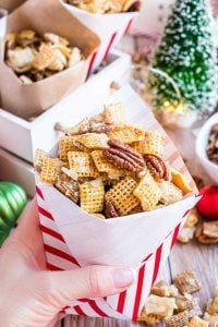 POV hand holding sweet chex-mix.