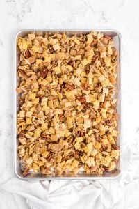 chex-mix across sheet pans.