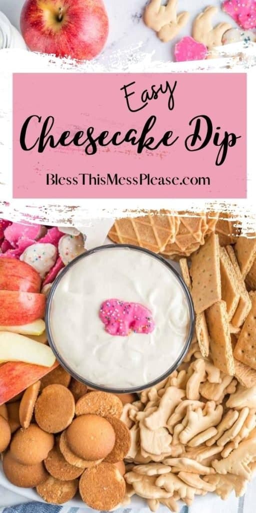 vertical pinterest pin the text reads: "Easy Cheesecake Dip" at the top of the page with a pink banner over an image that displays snacks and dip-able foods such as gram crackers, apples, and wafers with a silky white dip in the center wand an pink iced circus animal in the center of the un-eaten dip