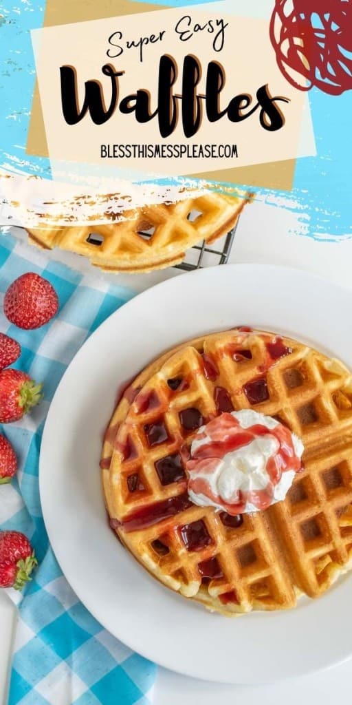 pinterest pin and the text reads "super easy waffles" - blue checkered napkin and strawberries surround a white plate with a golden brown waffle and a strawberry jam or preserve spills over a dollop of whipped cream in the center