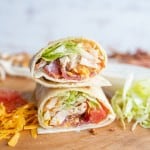 close up of the sliced end of the chicken wrap with bacon