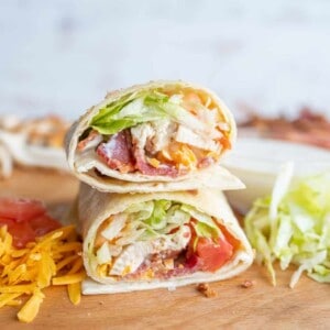 close up of the sliced end of the chicken wrap with bacon