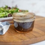 small mason jar of vinaigrette dressing