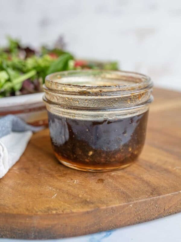 small mason jar of vinaigrette dressing