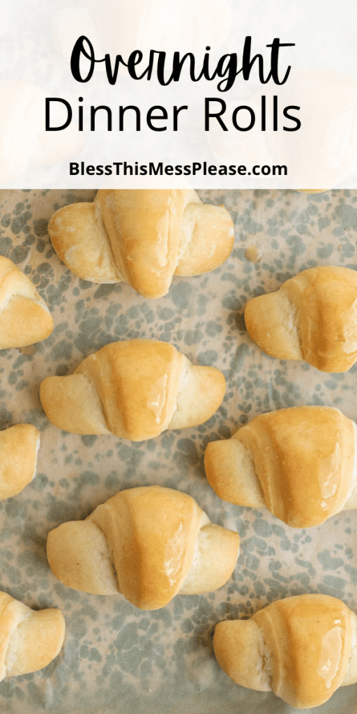 pin text reads "overnight dinner rolls" and baked and buttered croissant shaped rolls on a baking sheet