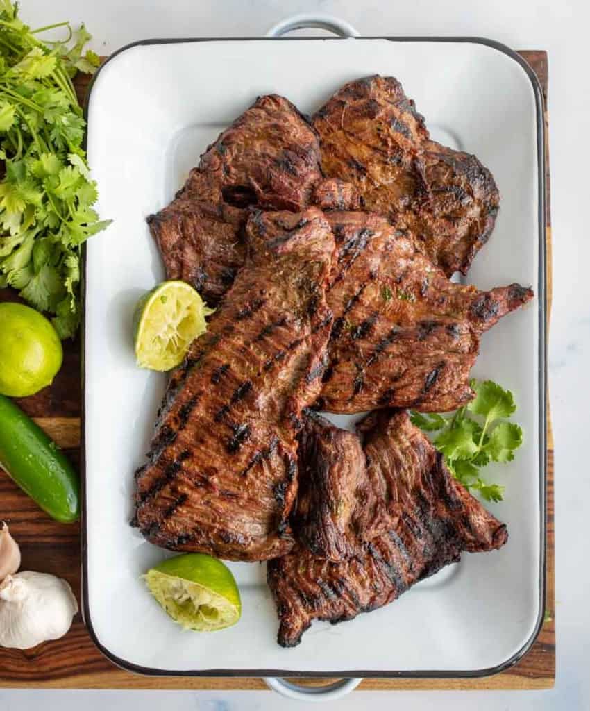 top view of carne asada steak on a white dish