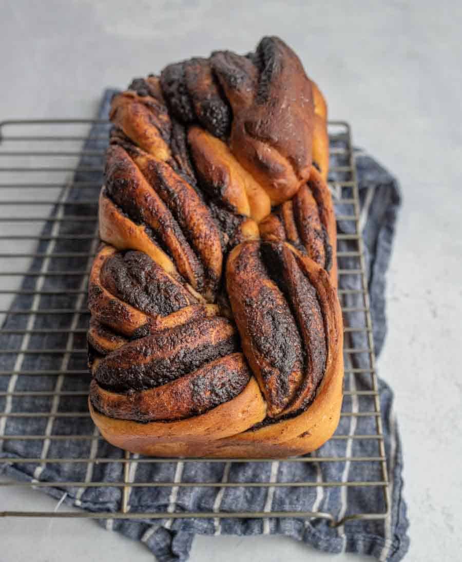 whole chocolate loaf on a cooling rack