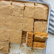 pumpkin cake in a sheet pan with a caramel icing on top