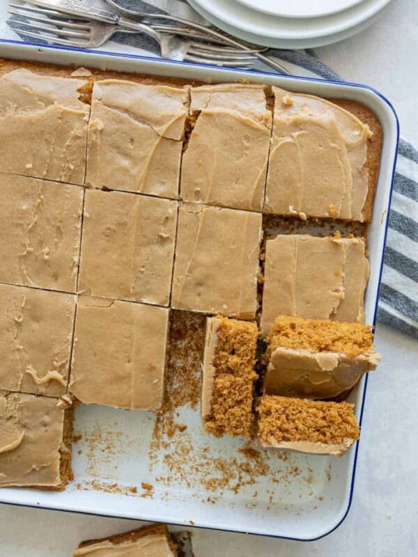 pumpkin cake in a sheet pan with a caramel icing on top