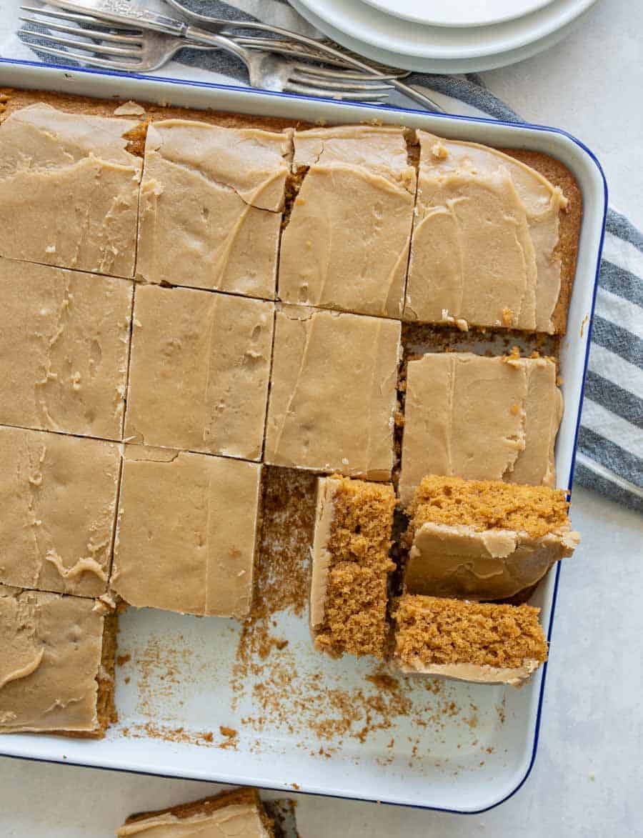 pumpkin cake in a sheet pan with a caramel icing on top