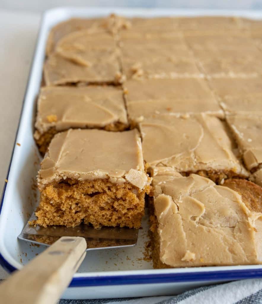 pumpkin cake in a sheet pan with a caramel icing on top