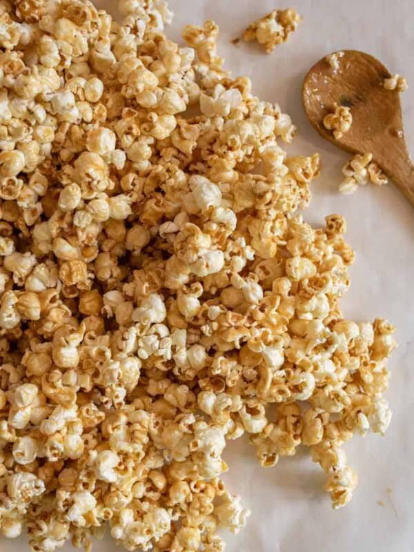 top view of soft caramel popcorn laid out on parchment paper