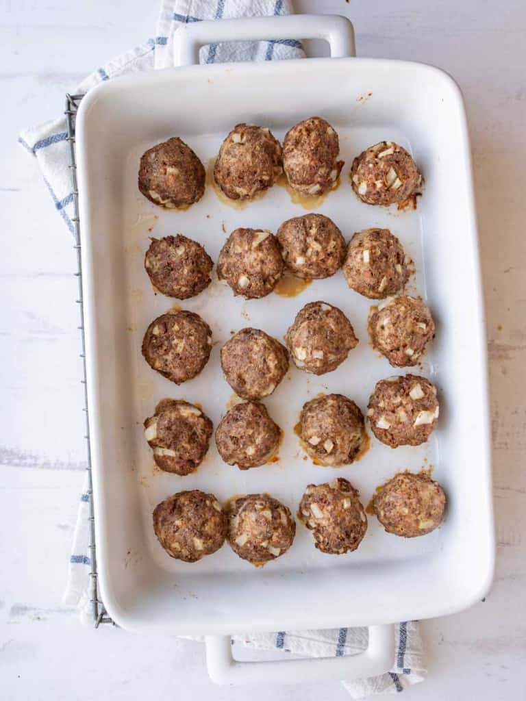 top view of a baking dish with cooked turkey meatballs