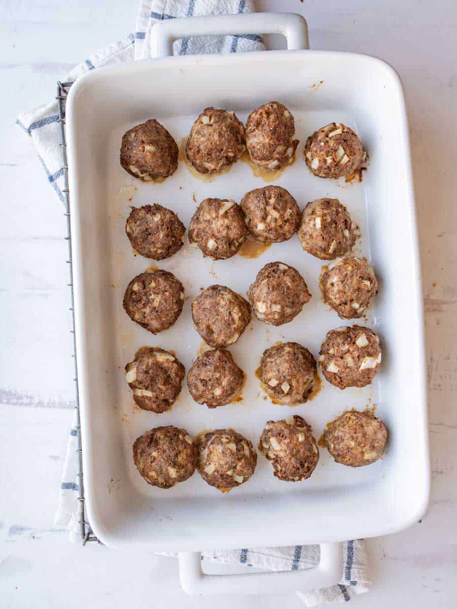 top view of a baking dish with cooked turkey meatballs