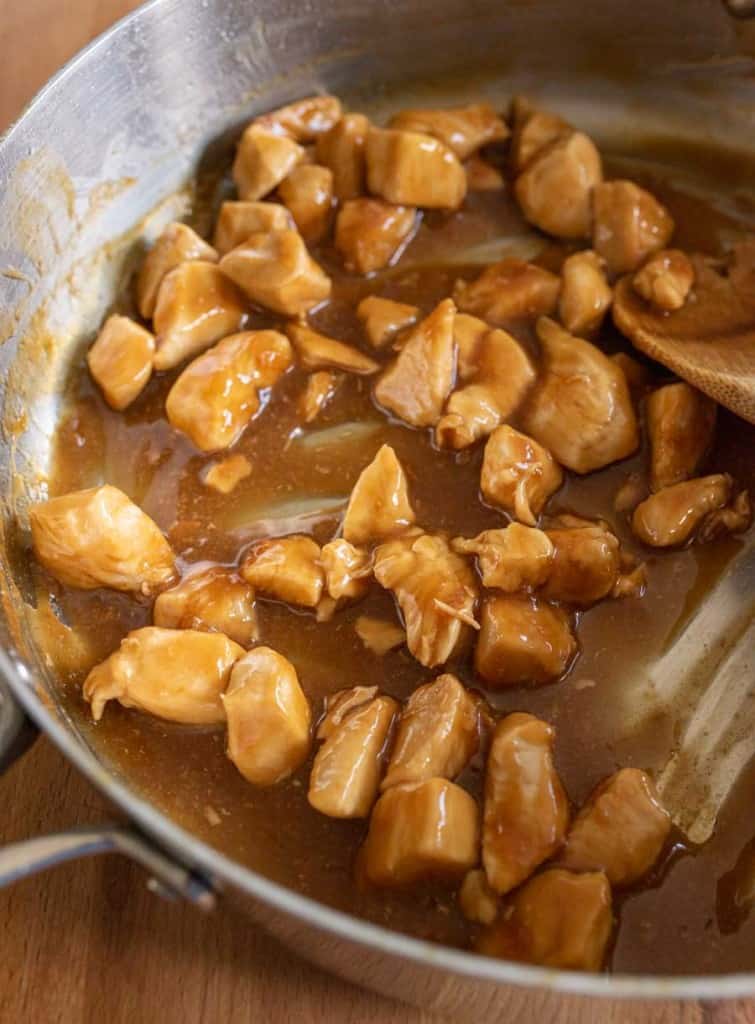 chicken pieces with teriyaki sauce in a pan