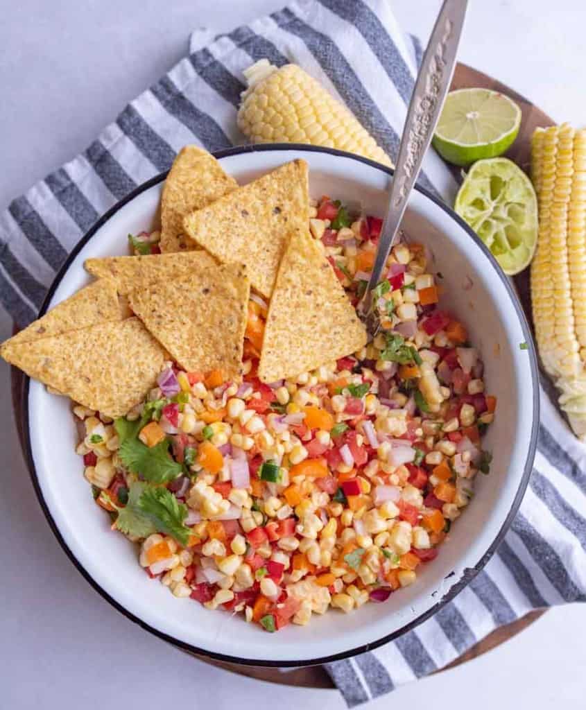 top view of corn salsa with tortilla chips