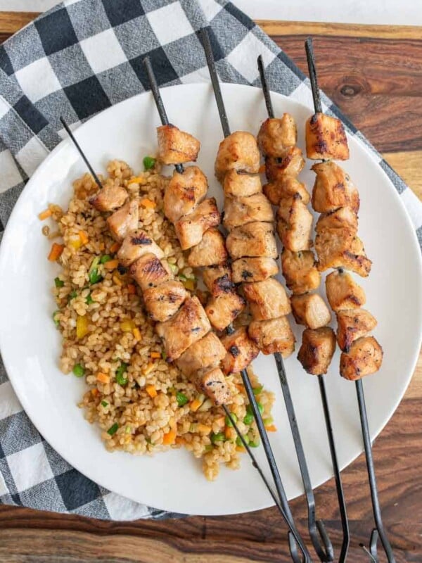 grilled chicken kabobs on a dinner plate