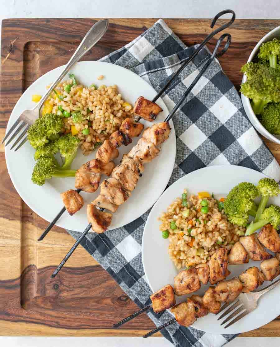 grilled chicken kabobs on a dinner plate