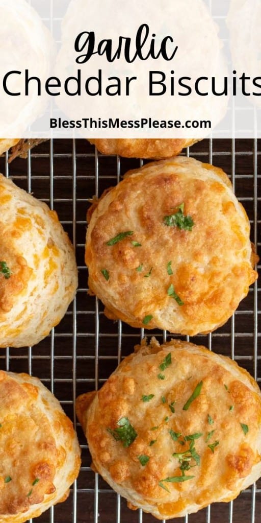 pin that reads "garlic cheddar biscuits" with image of biscuits on cooling rack