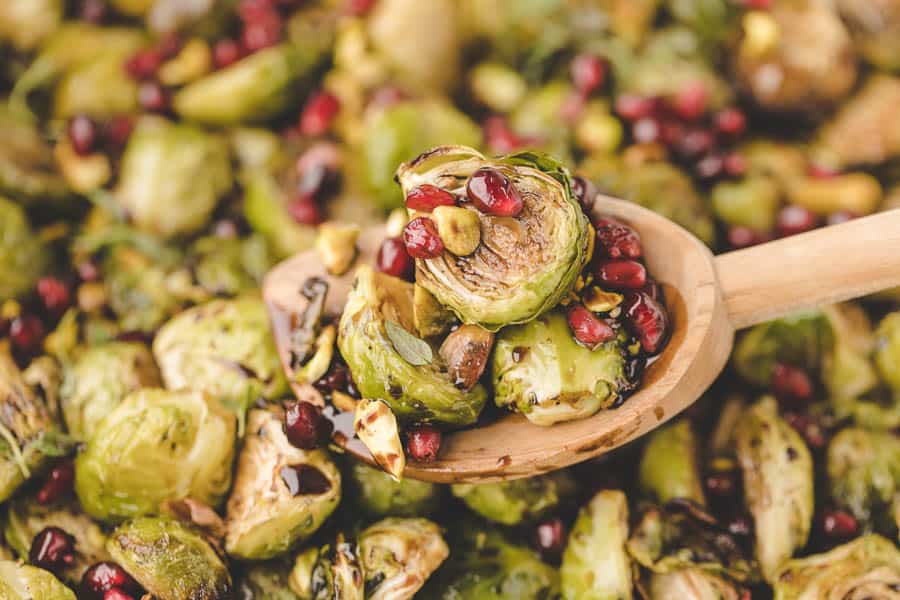 wooden spoon full of roasted Brussels