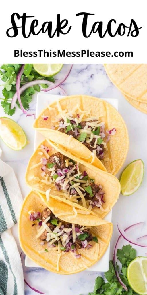 pintrest pin and the text reads "Steak Tacos" with a top view of three classic steak tacos