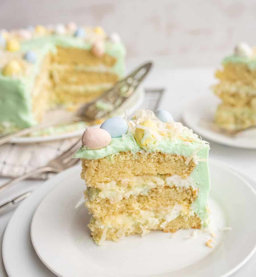 close up of a slice of coconut easter cake slice