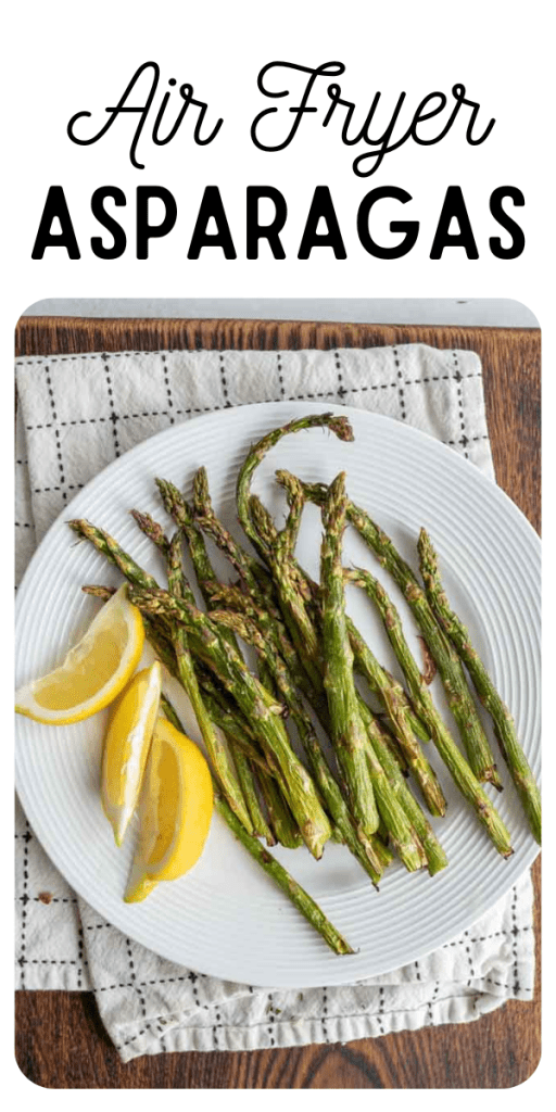 pin for air fryer asparagus with cooked asparagus on a white plate with lemon